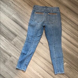 Size 4 WHBM Midrise Vegan Leather Trimmed Blue Jeans. Super cute